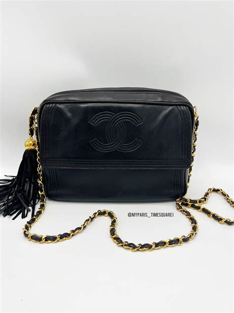 chanel camera bag price 2011|Chanel camera bag with tassel.